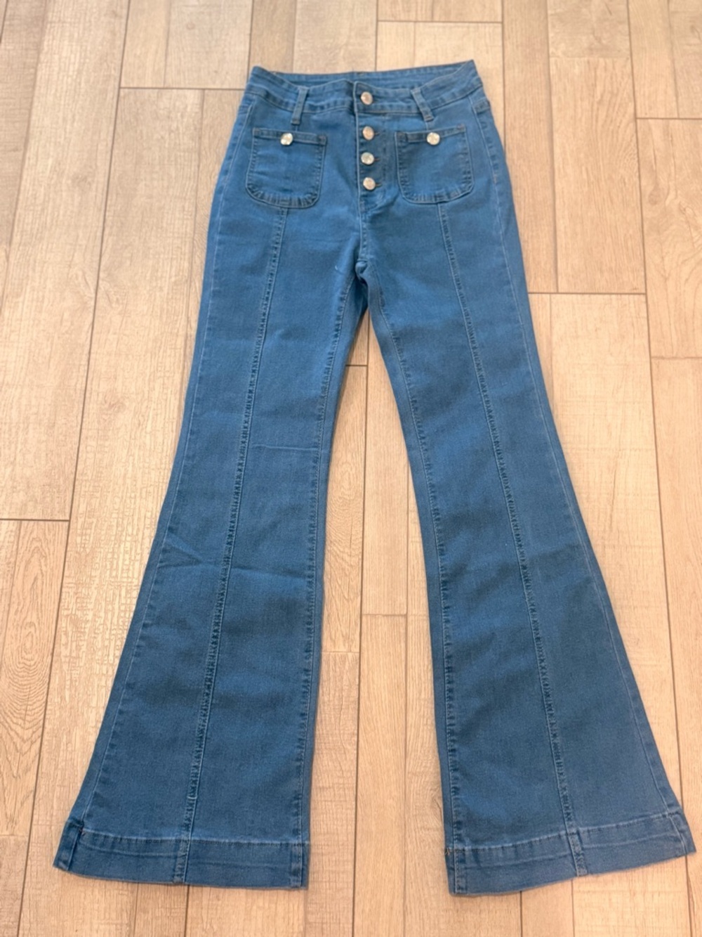 New High-Rise Flared Women's Jeans in Dark Blue Size Medium